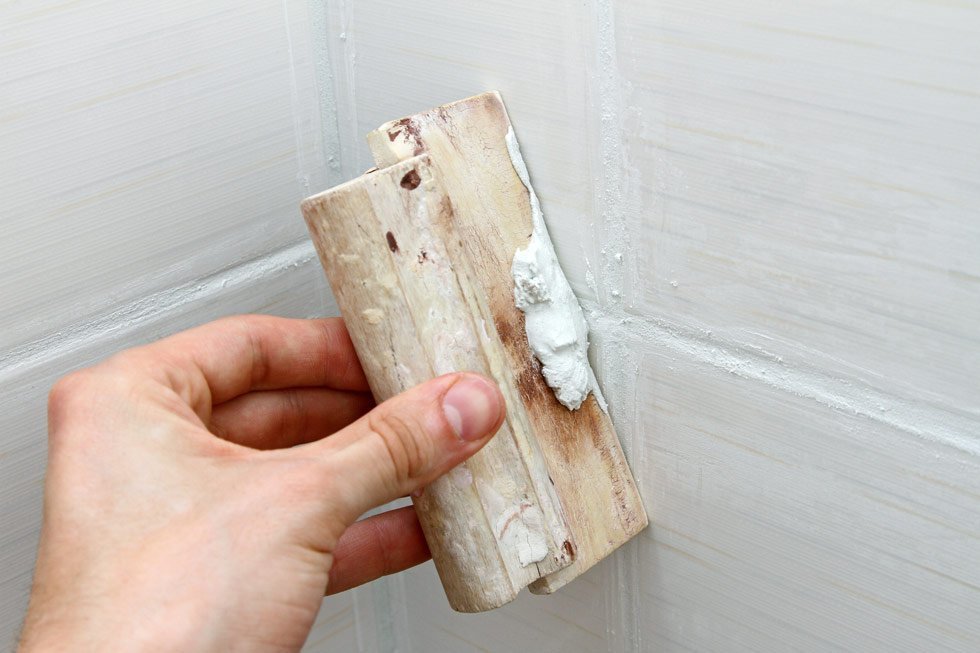 Re-grouting tile and grout
