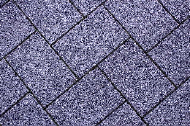 Herringbone floor tile with dark grout lines